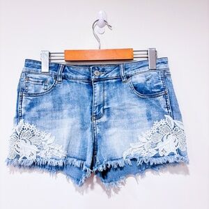 ARDENE Blue denim shorts with lace floral trim and frayed hem | Large *